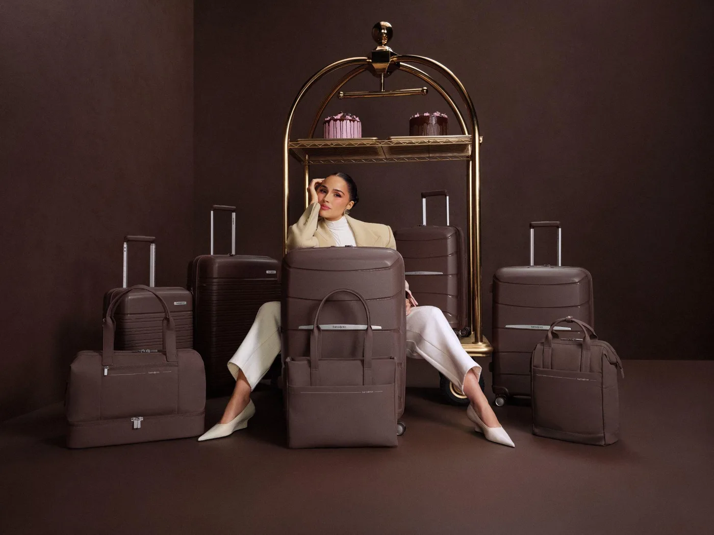 Olivia Culpo with Samsonite luggage in Chocolate Mauve